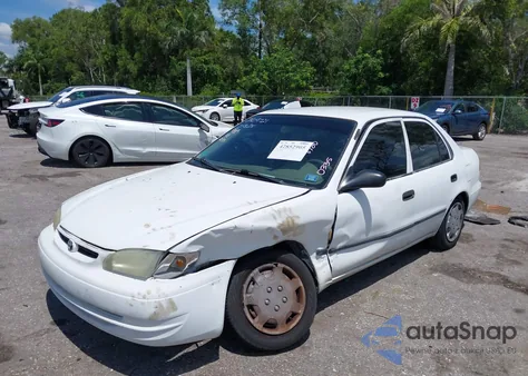 2000 Toyota Corolla Ce z USA, uszkodzony, nr VIN 1NXBR12E6YZ400335